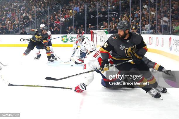 Deryk Engelland of the Vegas Golden Knights skates against the Tom Wilson of the Washington Capitals during the first period in Game Five of the 2018...