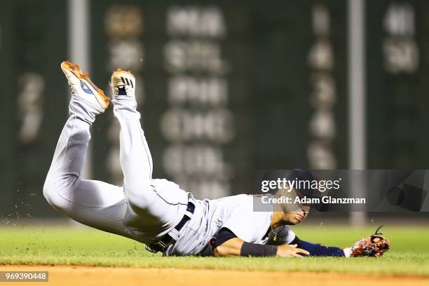 Jose Iglesias of the Detroit Tigers stops a ground ball in the seventh inning of a game against the Boston Red Sox at Fenway Park on June 07, 2018 in...