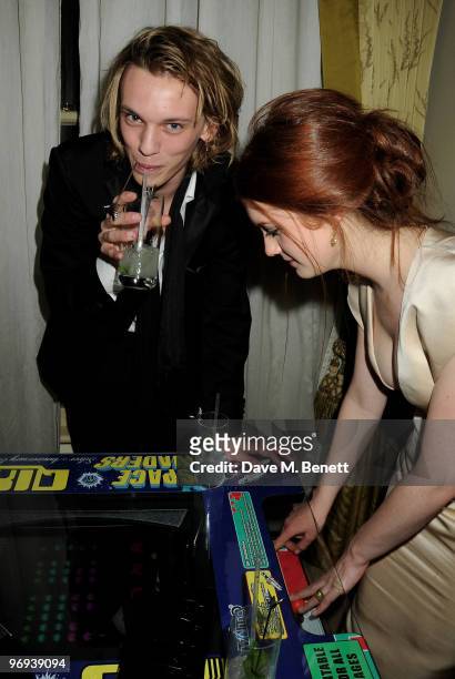 Jamie Campbell Bower and Bonnie Wright attend the BAFTA Soho House Grey Goose after party at the Grosvenor House Hotel on February 21, 2010 in...