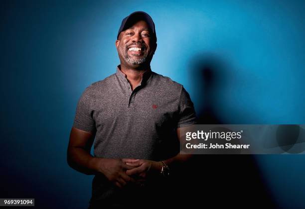 Musical artist Darius Rucker poses in the portrait studio at the 2018 CMA Music Festival at Nissan Stadium on June 7, 2018 in Nashville, Tennessee.