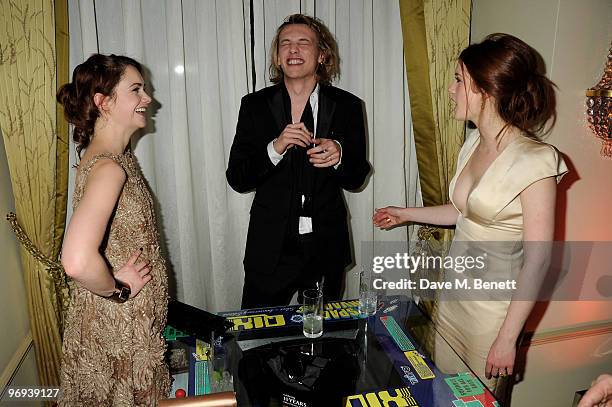 Ruth Wilson, Jamie Campbell Bower and Bonnie Wright attend the BAFTA Soho House Grey Goose after party at the Grosvenor House Hotel on February 21,...