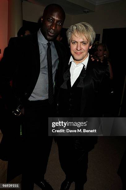Ozwald Boateng and Nick Rhodes attend the BAFTA Soho House Grey Goose after party at the Grosvenor House Hotel on February 21, 2010 in London,...