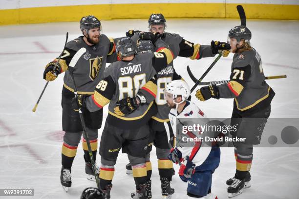 Nate Schmidt celebrates his goal with teammates Shea Theodore, Jonathan Marchessault, William Karlsson and Reilly Smith of the Vegas Golden Knights...