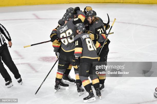 Nate Schmidt celebrates his goal with teammates Shea Theodore, Jonathan Marchessault and William Karlsson of the Vegas Golden Knights against the...