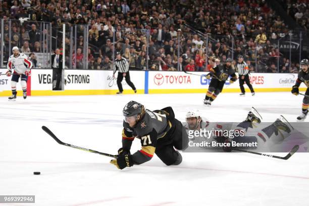Alex Ovechkin of the Washington Capitals is called for a tripping penalty on William Karlsson of the Vegas Golden Knights during the second period in...