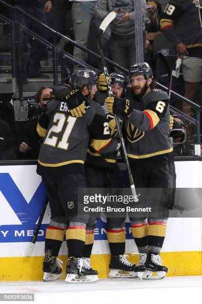 David Perron of the Vegas Golden Knights is congratulated by his teammates after scoring a second-period goal against the Washington Capitals in Game...
