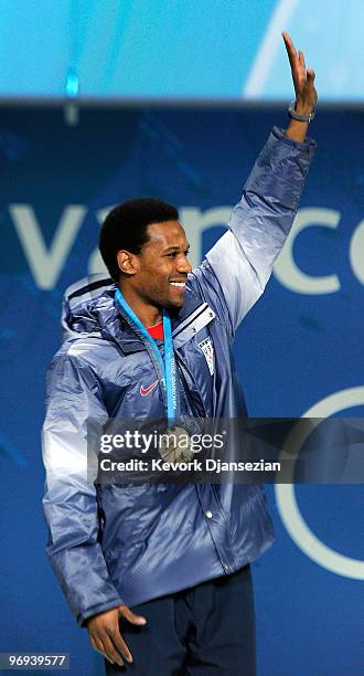 Shani Davis of United States celebrates his Silver medal during the medal ceremony for the Men�s 1500m Speed Skatingon day 10 of the Vancouver 2010...