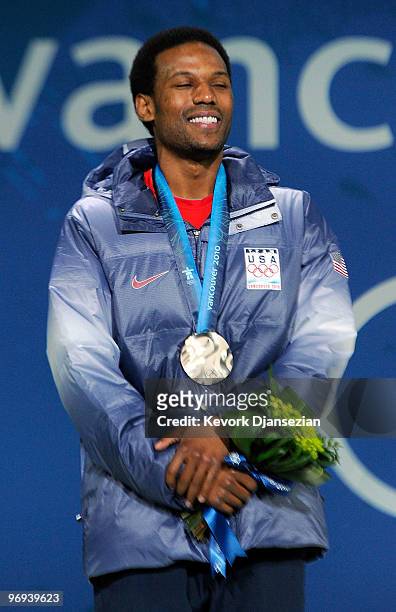Shani Davis of United States celebrates his Silver medal during the medal ceremony for the Men�s 1500m Speed Skatingon day 10 of the Vancouver 2010...