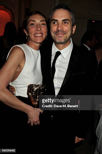 Martina Amati and Alfonso Cuaron attend the BAFTA Soho House Grey Goose after party at the Grosvenor House Hotel on February 21, 2010 in London,...