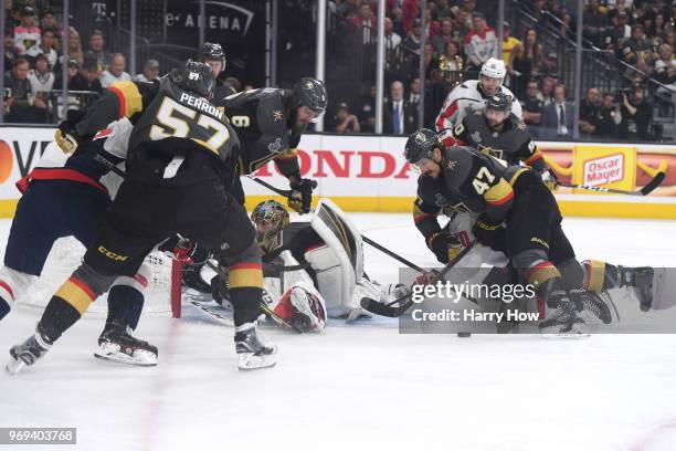 Luca Sbisa of the Vegas Golden Knights battles in front of Marc-Andre Fleury against the Washington Capitals during the second period in Game Five of...