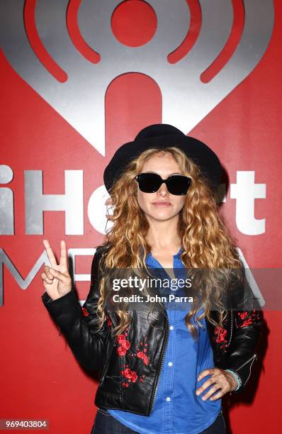 Paulina Rubio visits the "Enrique Santos Show" at I Heart Latino Studio on June 7, 2018 in Miramar, Florida.