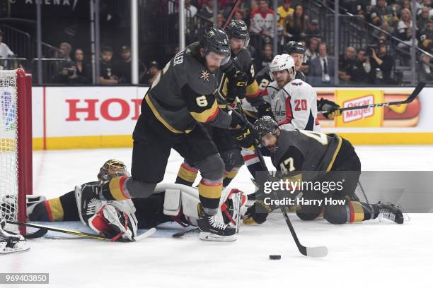 Luca Sbisa of the Vegas Golden Knights battles in front of Marc-Andre Fleury against the Washington Capitals during the second period in Game Five of...