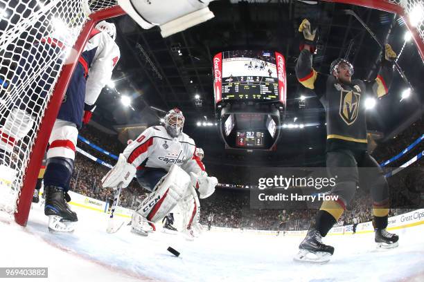 Reilly Smith of the Vegas Golden Knights celebrates his second-period goal as Braden Holtby of the Washington Capitals reacts in Game Five of the...