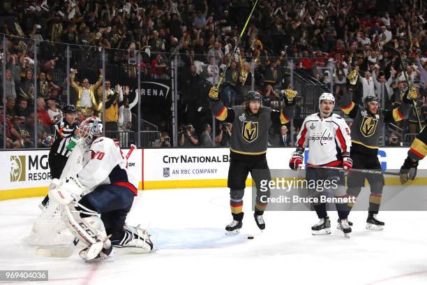 William Karlsson of the Vegas Golden Knights celebrates a goal by teammate Nate Schmidt during the second period against the Washington Capitalsin...