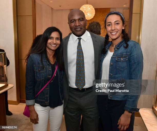 Boxer Evander Holyfield and guests attend a shopping event at David Yurman Copley Place Boston on June 7, 2018 in Boston, Massachusetts.