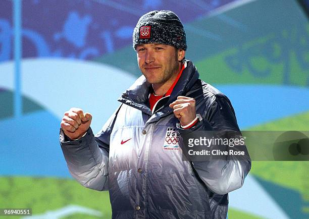 Bode Miller of the United States celebrates his Gold medal during the medal ceremony for the Men�s Alpine Skiing Super Combined on day 10 of the...
