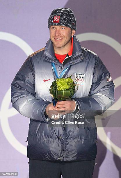 Bode Miller of the United States celebrates his Gold medal during the medal ceremony for the Men's Alpine Skiing Super Combined on day 10 of the...