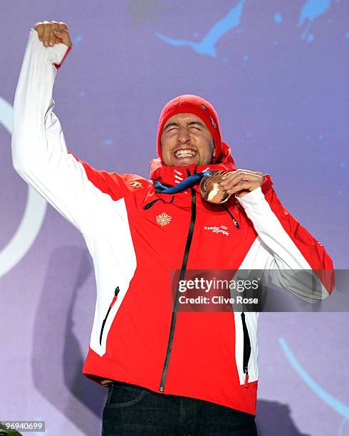 Silvan Zurbriggen of Switzerland celebrates his Bronze medal during the medal ceremony for the Men's Alpine Skiing Super Combined on day 10 of the...