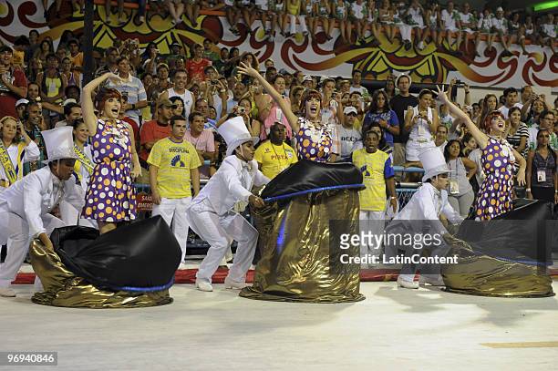 Members of Unidos da Tijuca Samba School dance during Rio de Janeiro's Carnival Champions Parade at Marques de Sapucai Sambodrome on February 21,...