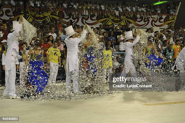 Members of Unidos da Tijuca Samba School dance during Rio de Janeiro's Carnival Champions Parade at Marques de Sapucai Sambodrome on February 21,...