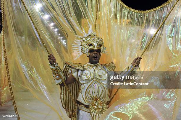 Member of Unidos da Tijuca Samba School dances during Rio de Janeiro's Carnival Champions Parade at Marques de Sapucai Sambodrome on February 21,...