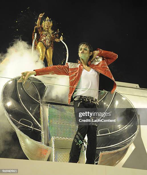 Member of Unidos da Tijuca Samba School dances during Rio de Janeiro's Carnival Champions Parade at Marques de Sapucai Sambodrome on February 21,...