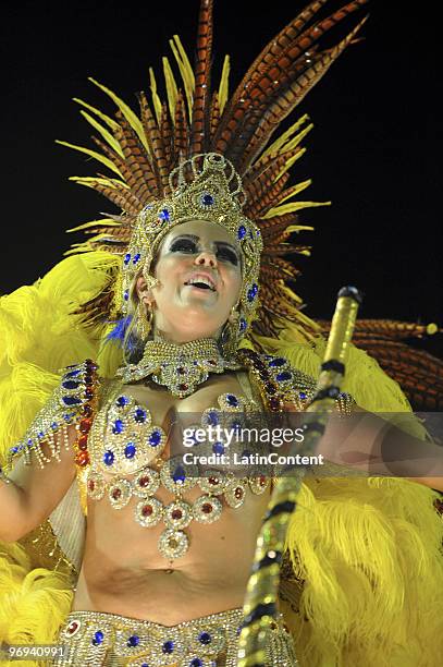 Member of Unidos da Tijuca Samba School dances during Rio de Janeiro's Carnival Champions Parade at Marques de Sapucai Sambodrome on February 21,...