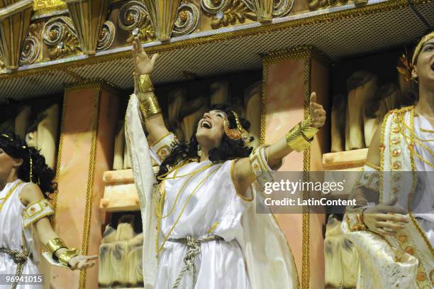 Member of Unidos da Tijuca Samba School dances during Rio de Janeiro's Carnival Champions Parade at Marques de Sapucai Sambodrome on February 21,...