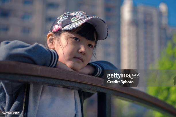 cute 8 years girl in the city - city life in almaty stockfoto's en -beelden