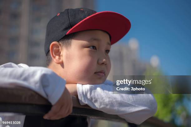 cute 10 years boy in the city - city life in almaty stockfoto's en -beelden