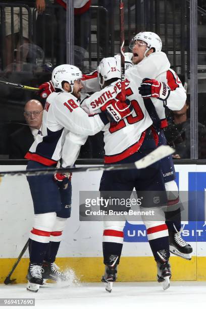 Devante Smith-Pelly of the Washington Capitals is congratulated by his teammates after scoring a third-period goal against the Vegas Golden Knights...