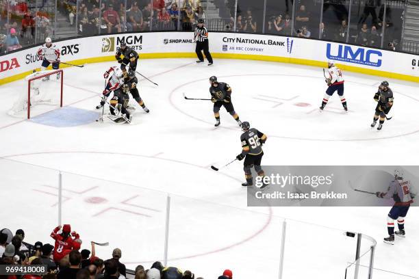 Lars Eller of the Washington Capitals scores a third-period goal past Marc-Andre Fleury of the Vegas Golden Knights in Game Five of the 2018 NHL...