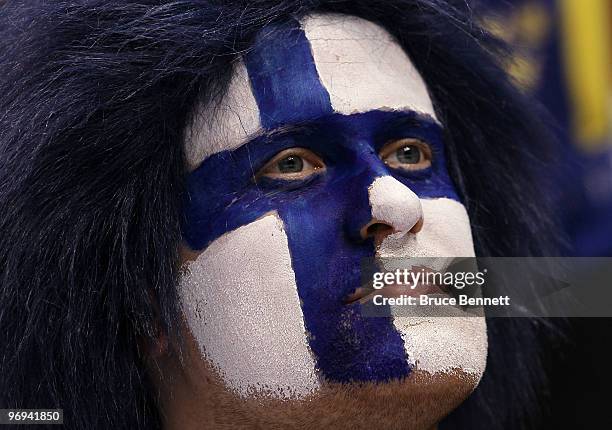 Fan in support of Finland looks on against Sweden during the ice hockey men's preliminary game between Sweden and Finland on day 10 of the Vancouver...