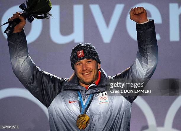 Gold medalist Bode Miller of the US reacts as he attends the medal ceremony for the men's Super Combined at Whistler Medals Plaza during the...