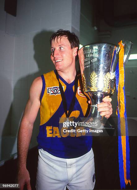 John Worsfold of the Eagles holds the Premiership trophy after winning the AFL Grand Final match between West Coast Eagles and Geelong Cats at the...