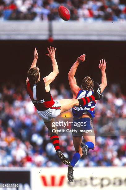 Mark Harvey of the Bombers marks over the Bulldogs defence during the round eight AFL match between Essendon Bombers and Western Bulldogs, 1996 in...