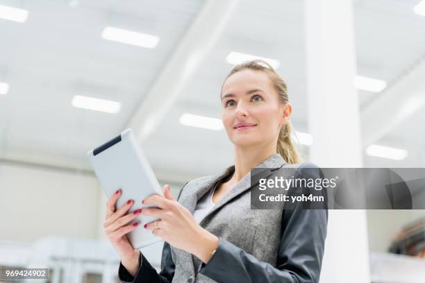 attractive inspector at factory - yoh4nn stock pictures, royalty-free photos & images