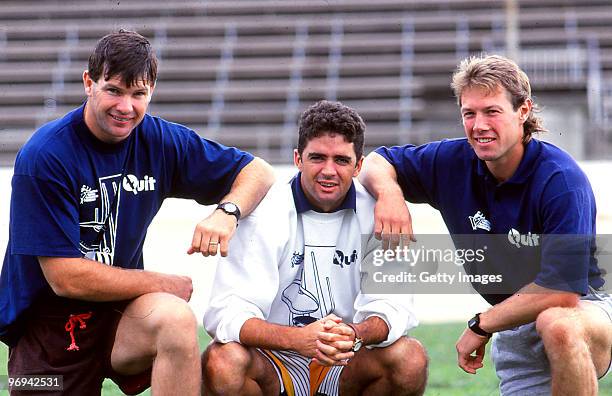 Danny Frawley of the Saints, Gary Lyon of the Demons and Gavin Brown of the Magpies pose, 1994 in Melbourne, Australia.