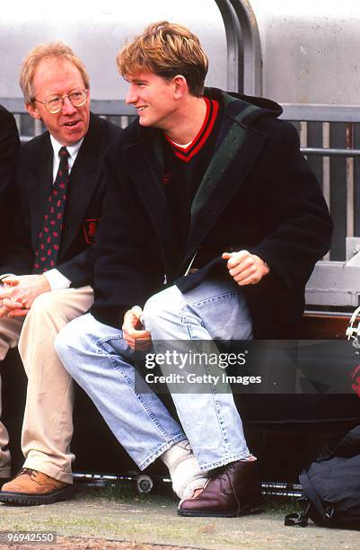 James Hird of the Bombers watches from the bench injured during the round 13 AFL match between Essendon Bombers and Richmond Tigers, 1997 in...