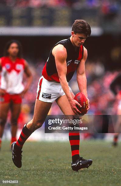 Matthew Lloyd of the Bombers lines up a kick at goal during the round 15 AFL match between Sydney Swans and Essendon Bombers, 1997 in Sydney,...