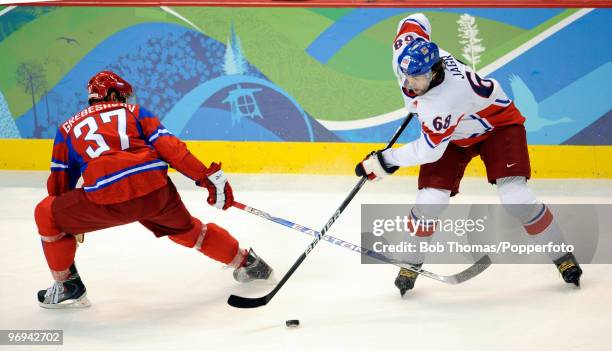 Jaromir Jagr of the Czech Republic with Denis Grebeshkov of Russia during the ice hockey men's preliminary game between Russia and Czech Republic on...