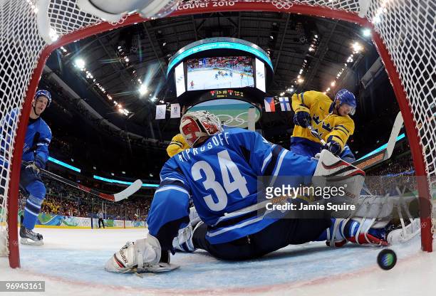 Loui Eriksson Sweden scores a goal past against Miikka Kiprusoff of Finald during the ice hockey men's preliminary game on day 10 of the Vancouver...