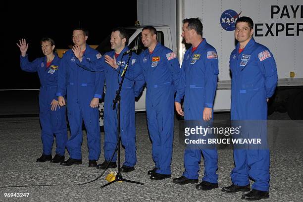 Space shuttle Endeavour STS-130 crew waves as post flight inspections are conducted after the crews return at Kennedy Space Center in Cape Canaveral,...