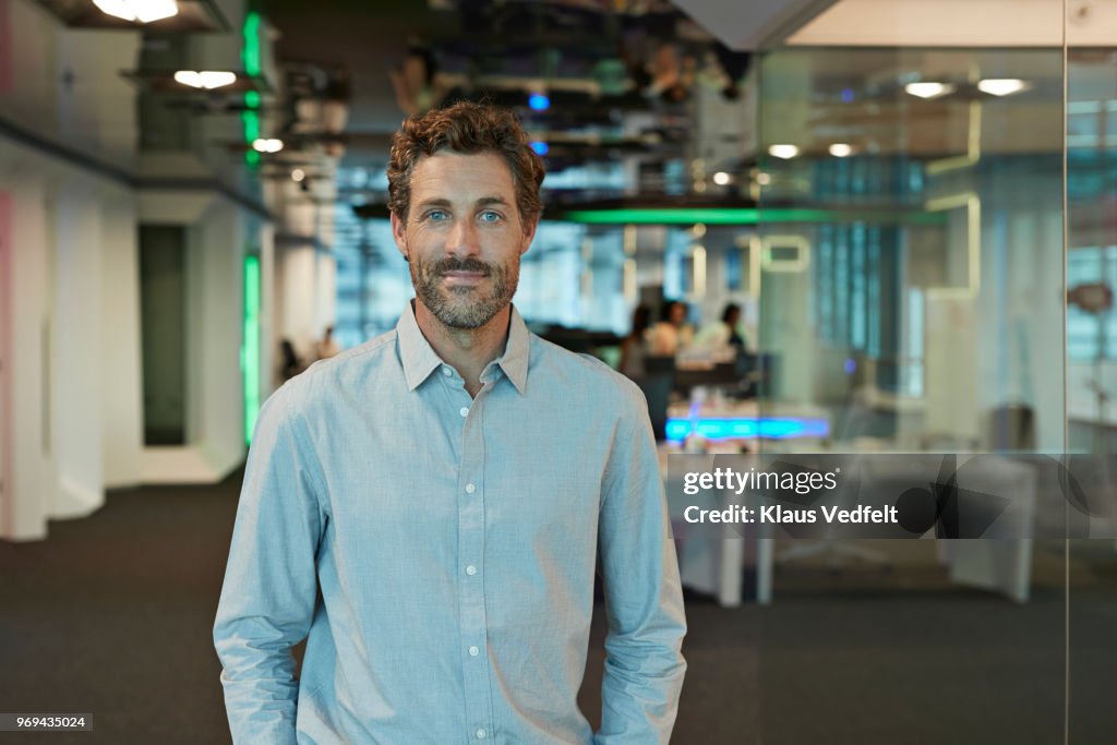 Portrait of businessman inside high-tech office