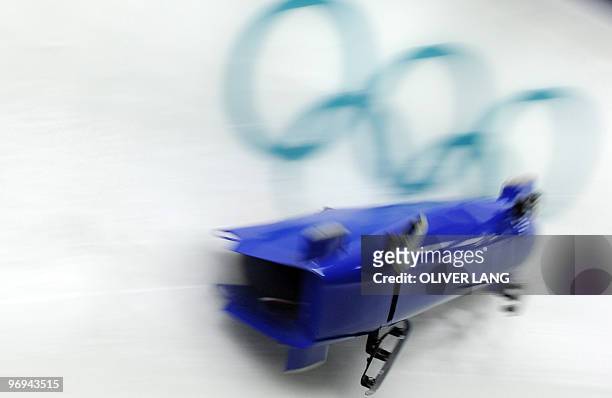 The British-2 bobsleigh pilot Paula Walker crashes during a training session at Whistler sliding centre during the Vancouver Winter Olympics on...