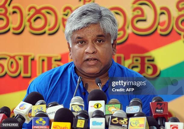 Sri Lankan former cricket captain Arjuna Ranatunga addresses reporters in Colombo on February 22 during the launch of the new opposition alliance....