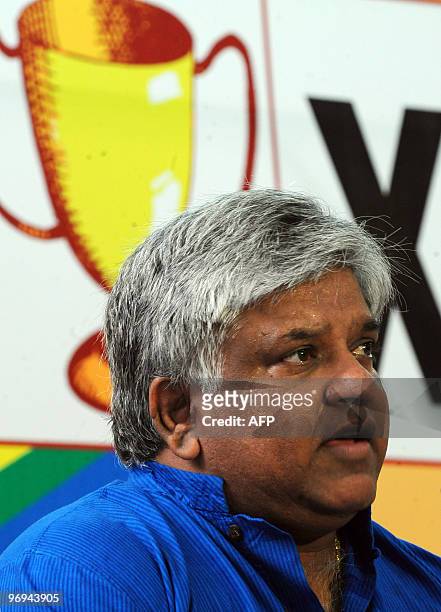 Sri Lankan former cricket captain Arjuna Ranatunga addresses reporters in Colombo on February 22 during the launch of the new opposition alliance....