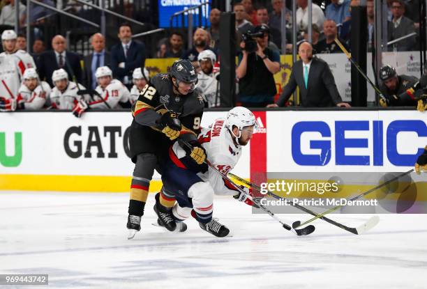 Tomas Nosek of the Vegas Golden Knights checks Tom Wilson of the Washington Capitals during the third period of Game Five of the 2018 NHL Stanley Cup...