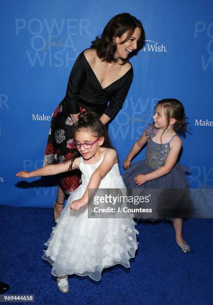 Actress/comedian Tina Fey dance with Isadora Doeschner and Jackie Geller from the Make-A-Wish Foundation at the 35th Anniversary Make-A-Wish Metro...