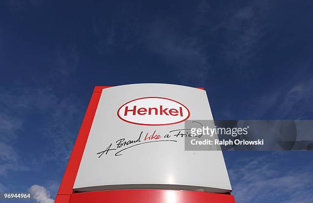Logo of German toiletries, cosmetics and detergent maker Henkel stands in the light at the manufacturing plant on February 16, 2010 in Duesseldorf,...